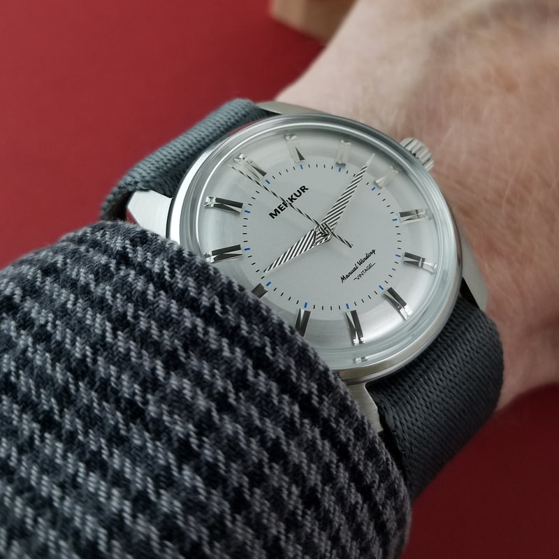 Merkur watch with highly visible hands